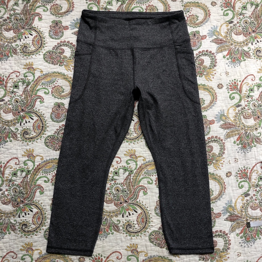 Grey RBX high-waisted cropped leggings with pockets